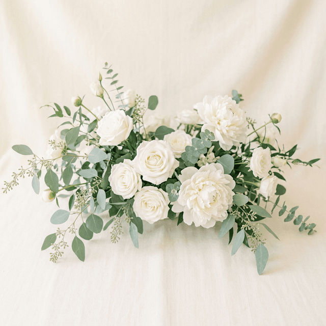 Luxury wedding floral arrangement by Blooms In Ribbon