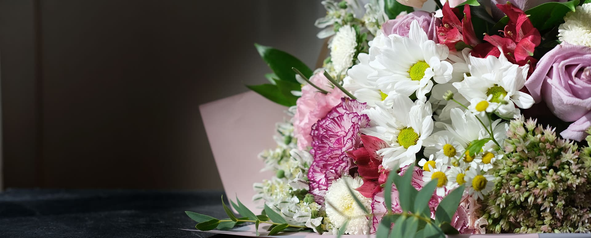 Reception centerpiece on dark table