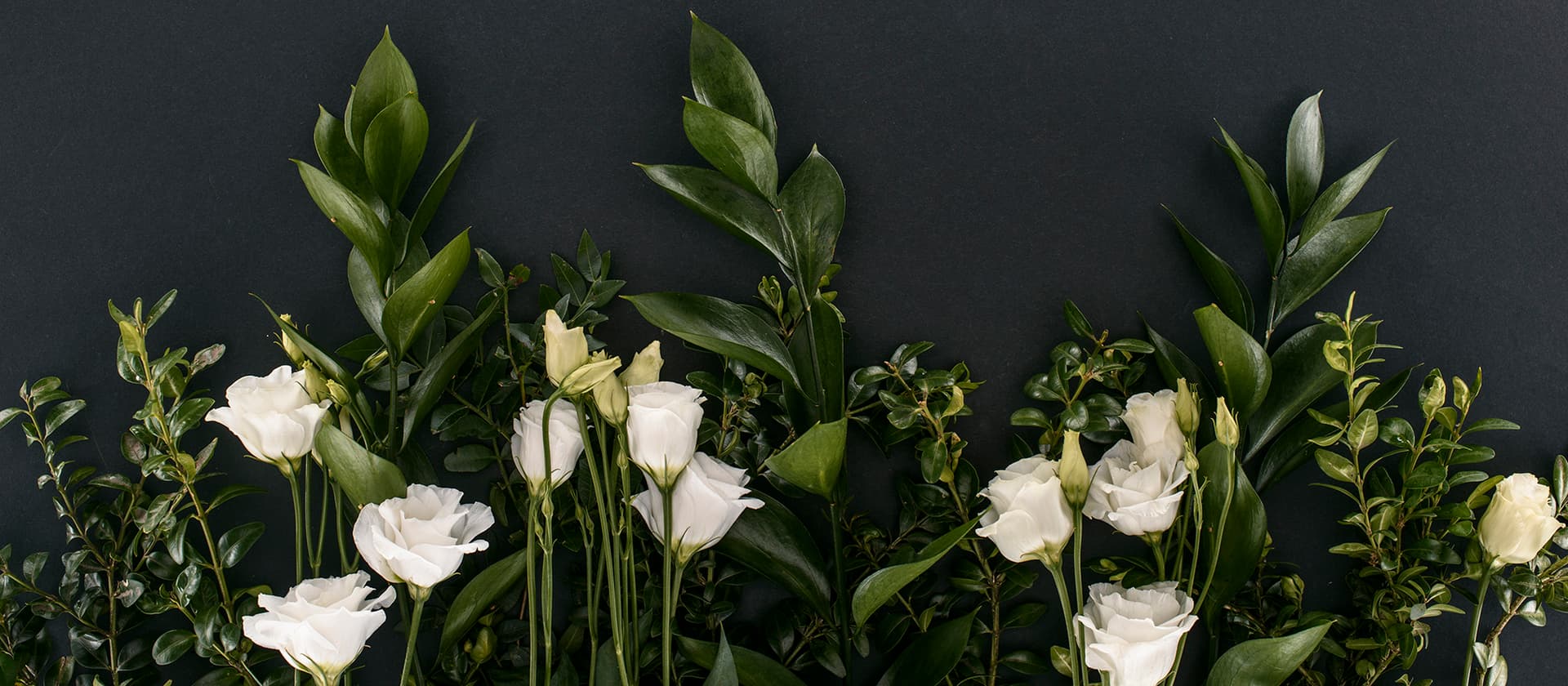 Eustoma and branches floral flat lay