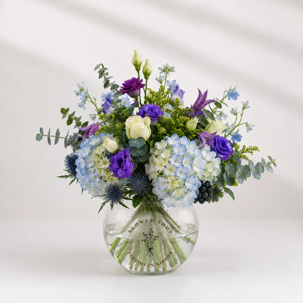 Blue Skies Arrangement  — Flowers in a Vase by Blooms In Ribbon
