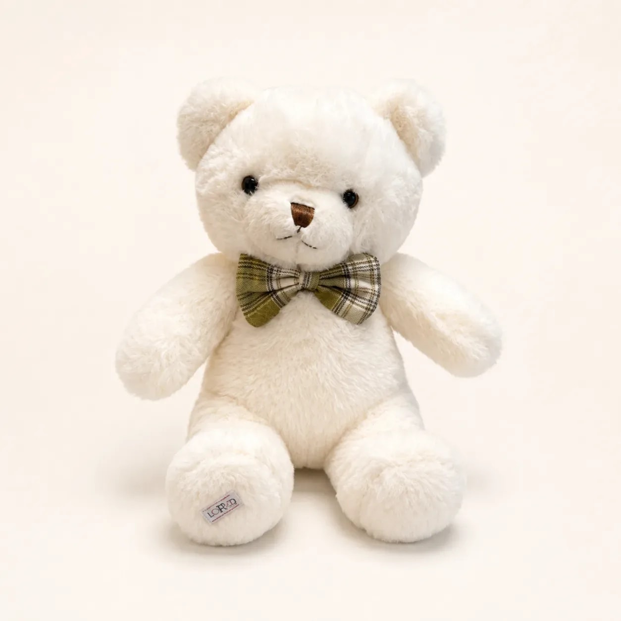 Ivory Teddy Bear, a gift from Blooms In Ribbon